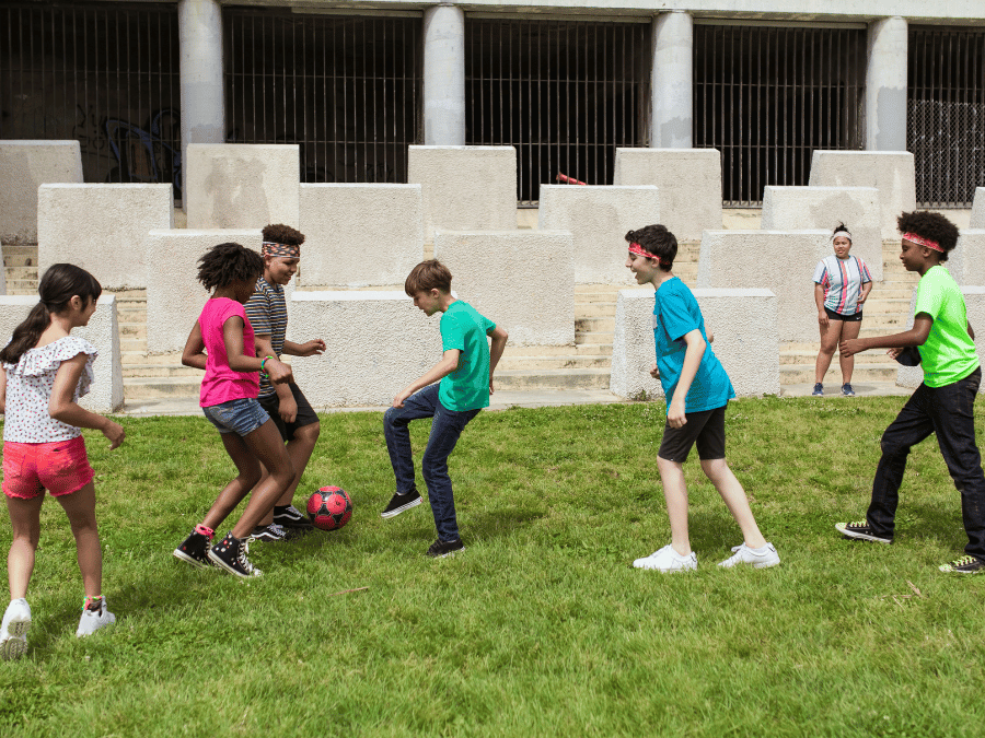 Campers enjoying outdoor summer camp activities